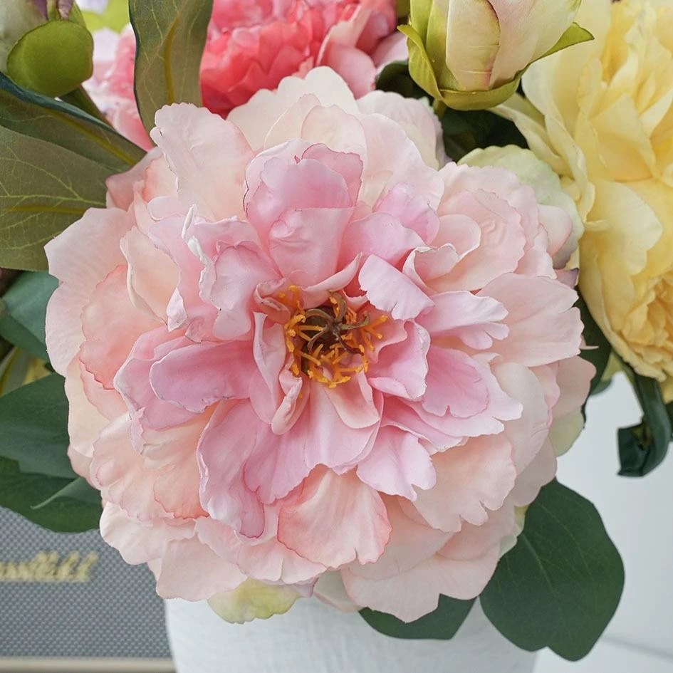 Close-up of a pink artificial peony from the Rosan Alibaba listing